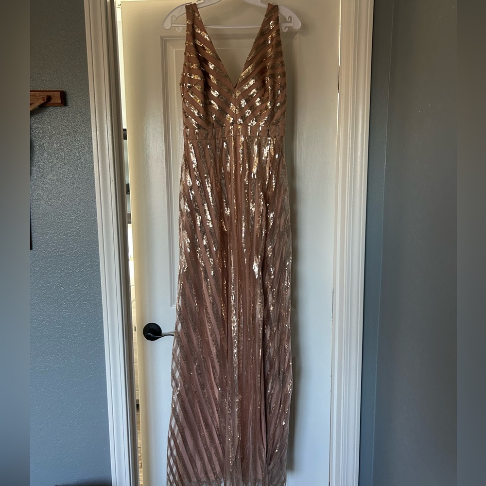 Elegant rose gold maxi dress, perfect for any special occasion.
